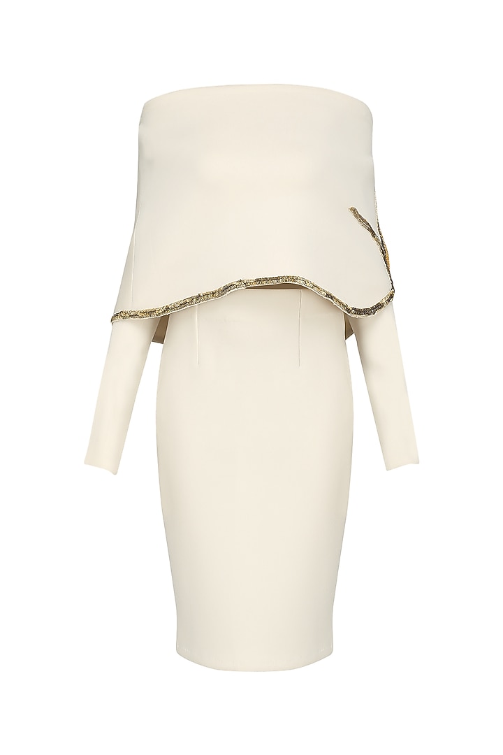 Cream off-shoulder embroidered cape and fitted skirt available only at Pernia's Pop Up Shop.