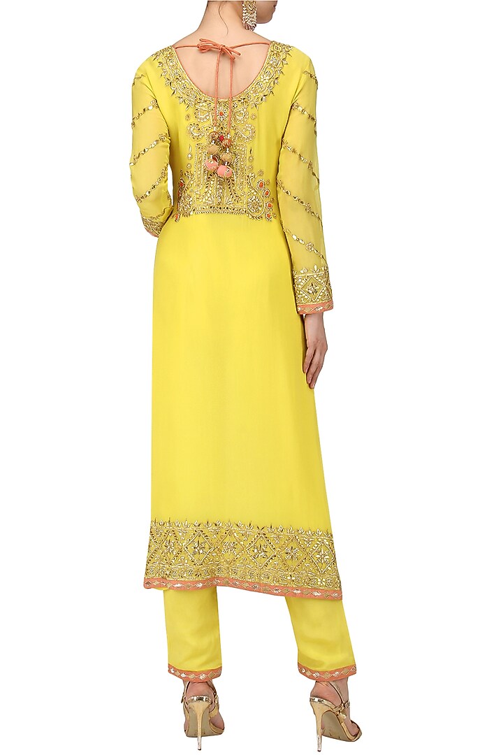 Yellow and tangerine embroidered kurta set available only at Pernia's Pop Up Shop.