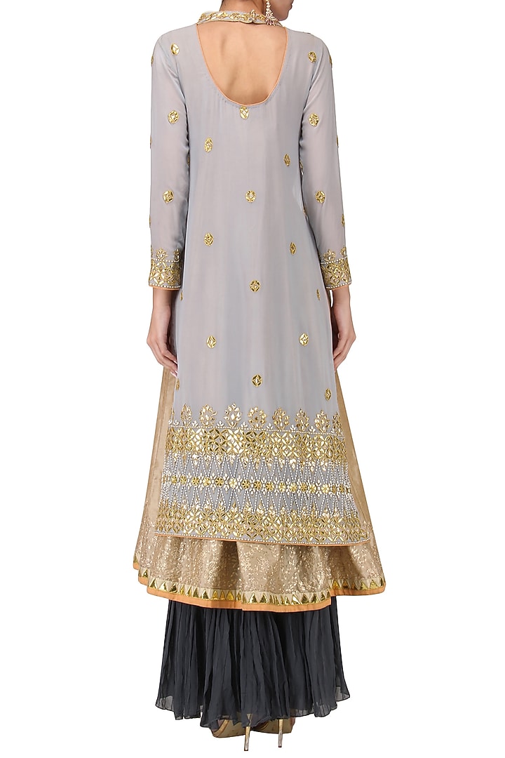 Powder blue embroidered kurta with navy blue sharara pants set available only at Pernia's Pop Up Shop.