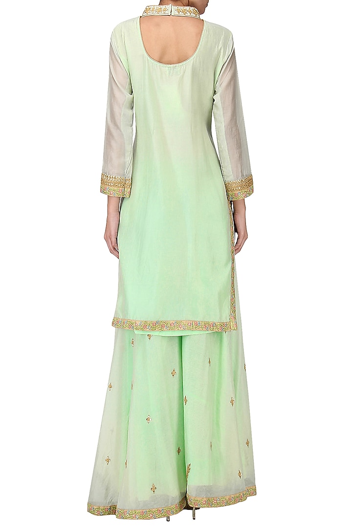 Pastel green embroidered lehenga set available only at Pernia's Pop Up Shop.