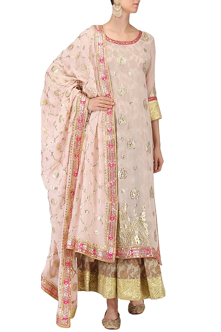 Powder pink and beige embroidered kurta set available only at Pernia's Pop Up Shop.
