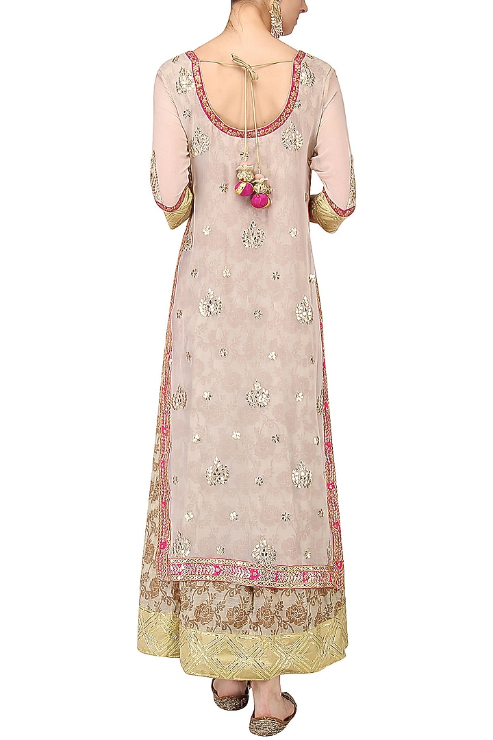 Powder pink and beige embroidered kurta set available only at Pernia's Pop Up Shop.