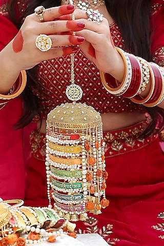 Gold Finish Pearl Beaded Meenakari Kaleeras (Set of 2) by Beabhika