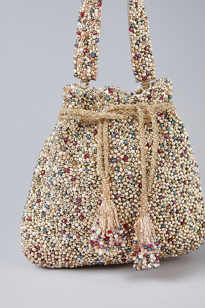 Gold Vegan Leather Ruby Stone Embellished Potli by BEAU MONDE at Pernia's Pop Up Shop