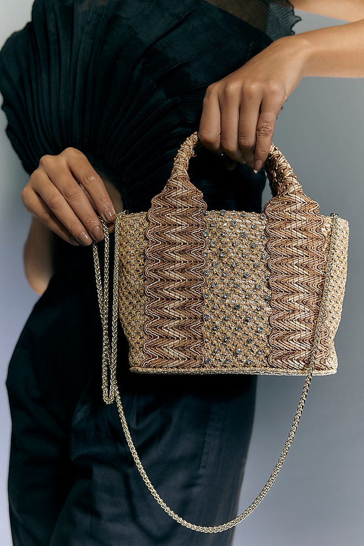 Golden Faux Leather Metal Stud Lace Clutch by BEAU MONDE at Pernia's Pop Up Shop