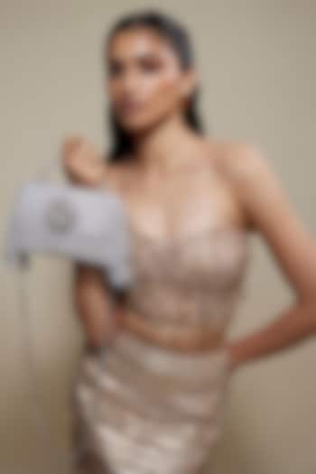 Silver Faux Leather Crystal Knot Work Sling Bag by BEAU MONDE at Pernia's Pop Up Shop