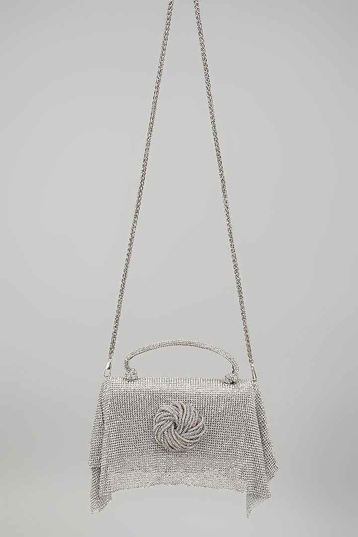 Silver Faux Leather Crystal Knot Work Sling Bag by BEAU MONDE at Pernia's Pop Up Shop