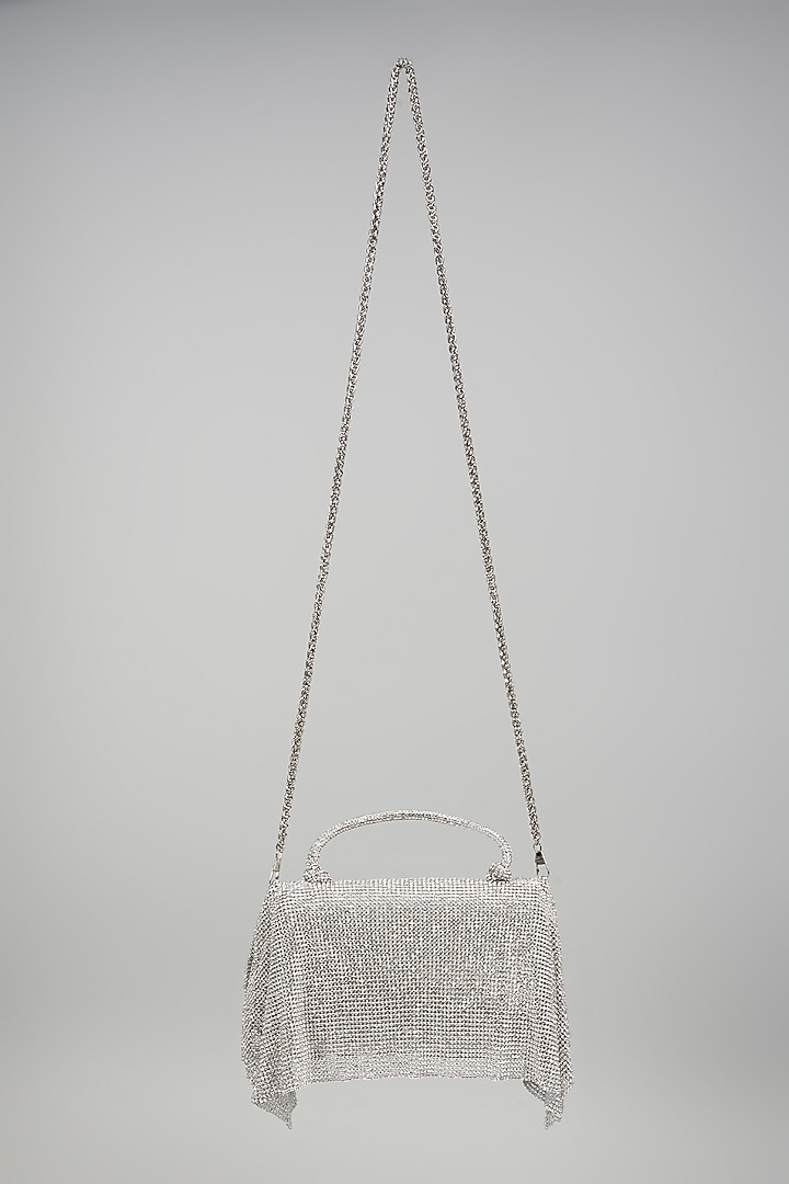 Silver Faux Leather Crystal Knot Work Sling Bag by BEAU MONDE at Pernia's Pop Up Shop
