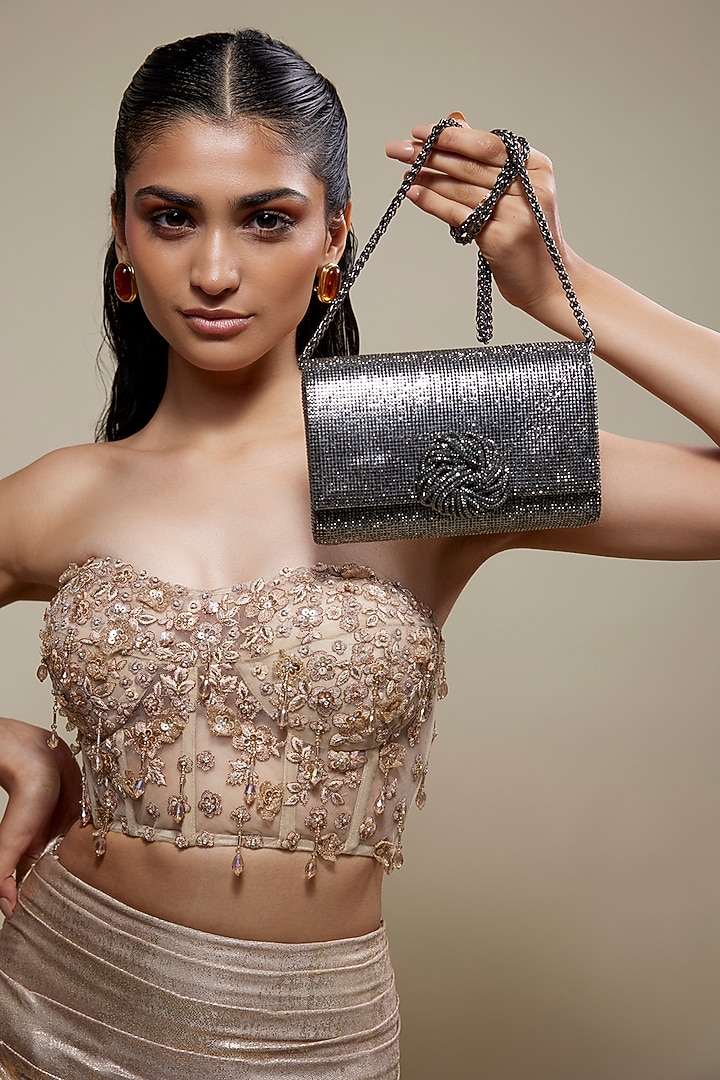 Black Faux Leather Crystal Knot Work Sling Bag by BEAU MONDE at Pernia's Pop Up Shop