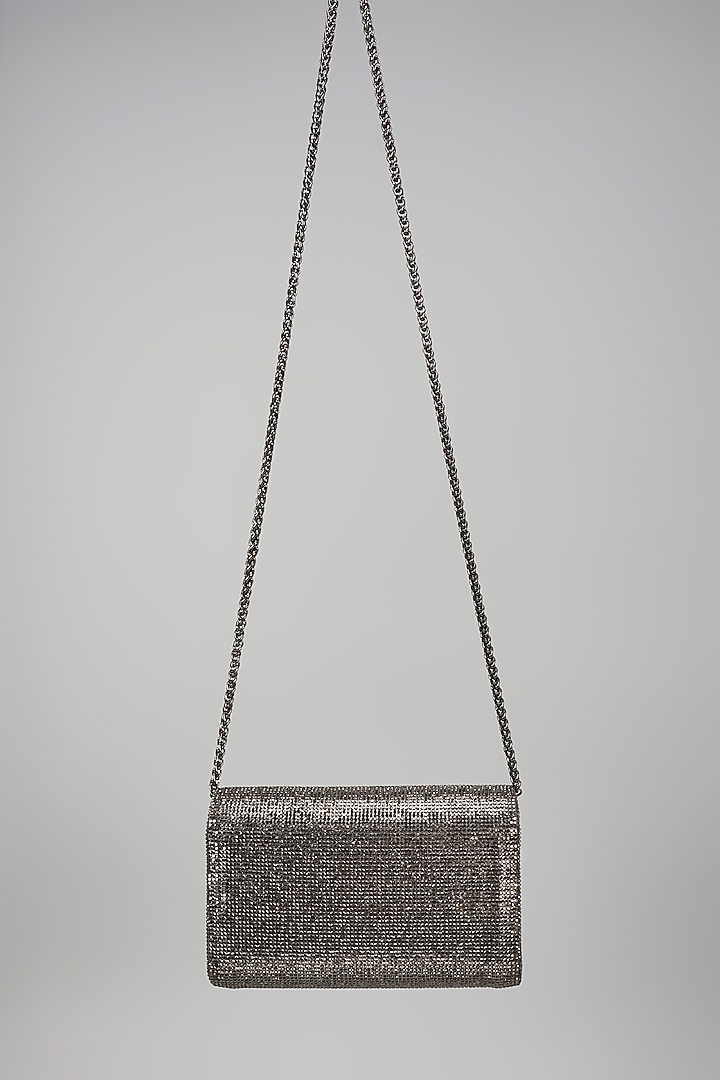 Black Faux Leather Crystal Knot Work Sling Bag by BEAU MONDE at Pernia's Pop Up Shop