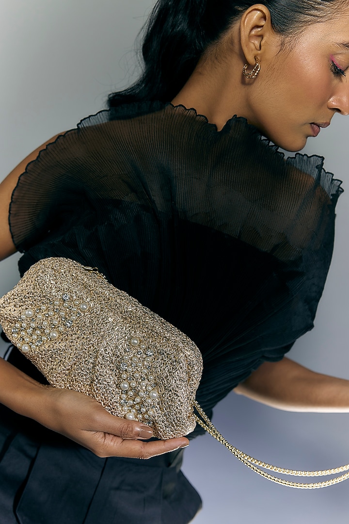 Golden Satin Hand Embroidered Pouch by BEAU MONDE at Pernia's Pop Up Shop