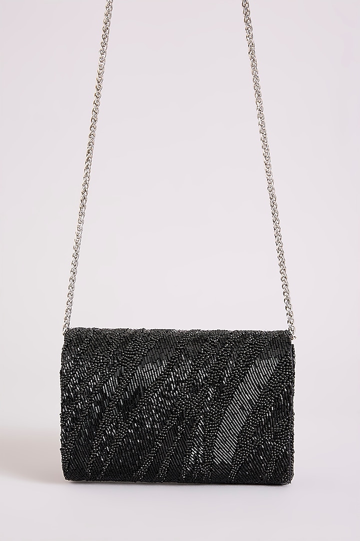 Black Shimmer Faux Leather Clutch by BEAU MONDE at Pernia's Pop Up Shop