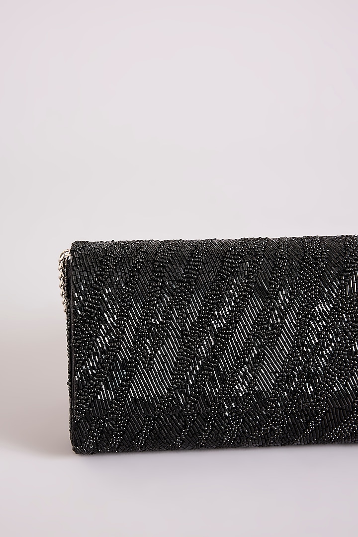 Black Shimmer Faux Leather Clutch by BEAU MONDE at Pernia's Pop Up Shop