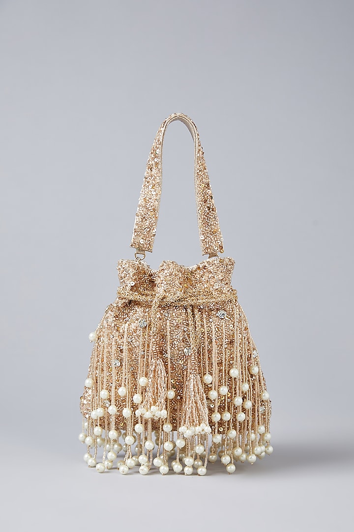 Gold Vegan Leather Tassel Embellished Potli by BEAU MONDE at Pernia's Pop Up Shop