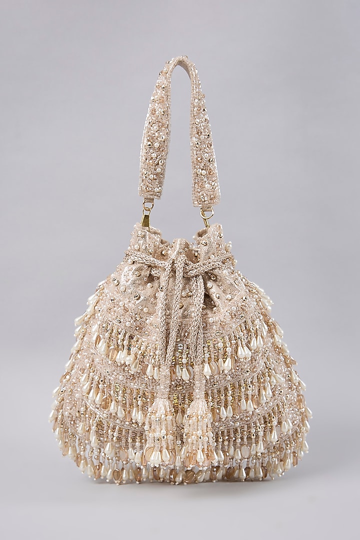 Champagne Gold Vegan Leather Tasseled Potli Bag by BEAU MONDE at Pernia's Pop Up Shop