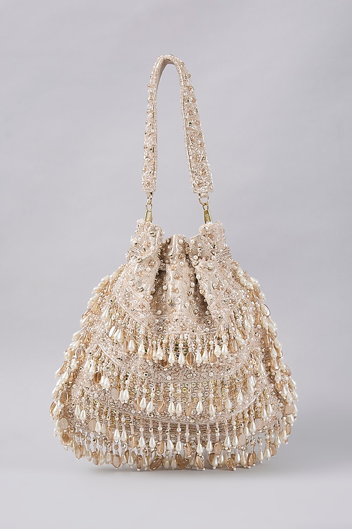 Champagne Gold Vegan Leather Tasseled Potli Bag by BEAU MONDE at Pernia's Pop Up Shop