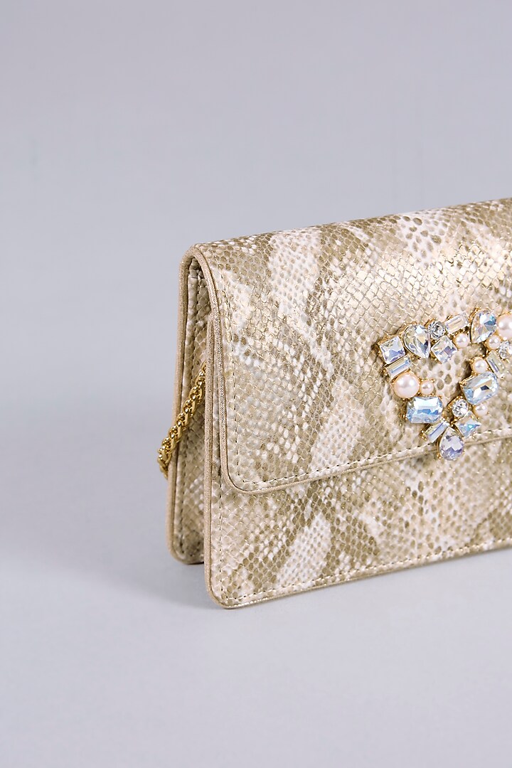 Gold & Silver Faux Leather Clutch by BEAU MONDE at Pernia's Pop Up Shop