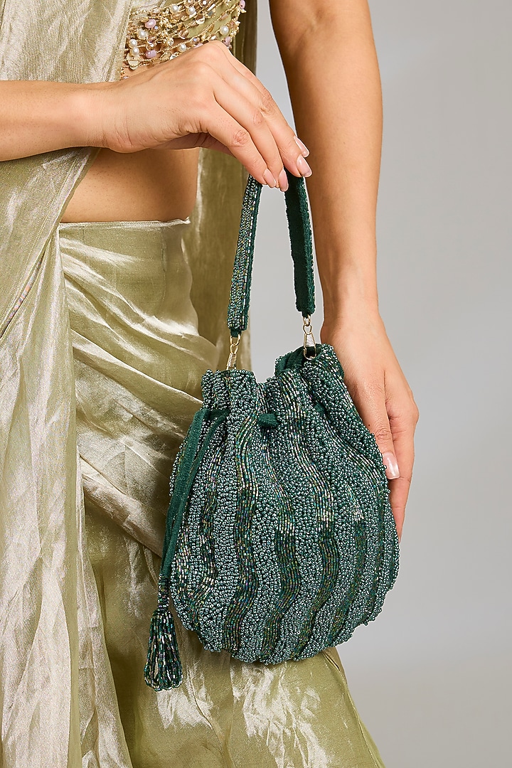 Green Shimmer Faux Leather Potli by BEAU MONDE at Pernia's Pop Up Shop