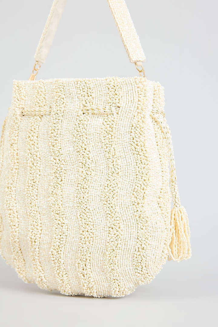 Ivory Faux Leather Potli by BEAU MONDE at Pernia's Pop Up Shop