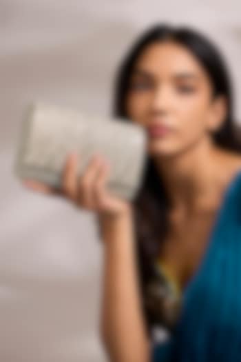 Silver Shimmer Faux Leather Clutch by BEAU MONDE at Pernia's Pop Up Shop