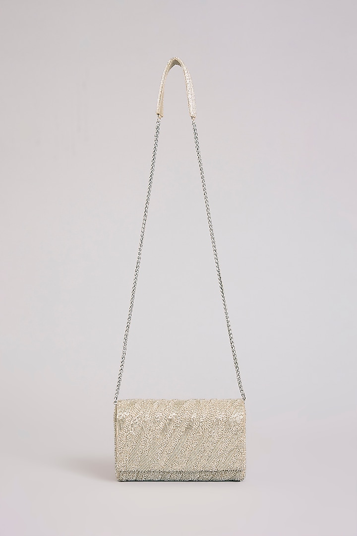 Silver Shimmer Faux Leather Clutch by BEAU MONDE at Pernia's Pop Up Shop