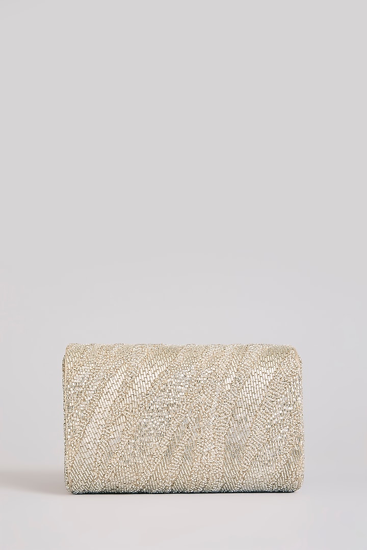 Silver Shimmer Faux Leather Clutch by BEAU MONDE at Pernia's Pop Up Shop