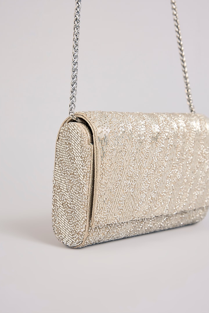 Silver Shimmer Faux Leather Clutch by BEAU MONDE at Pernia's Pop Up Shop