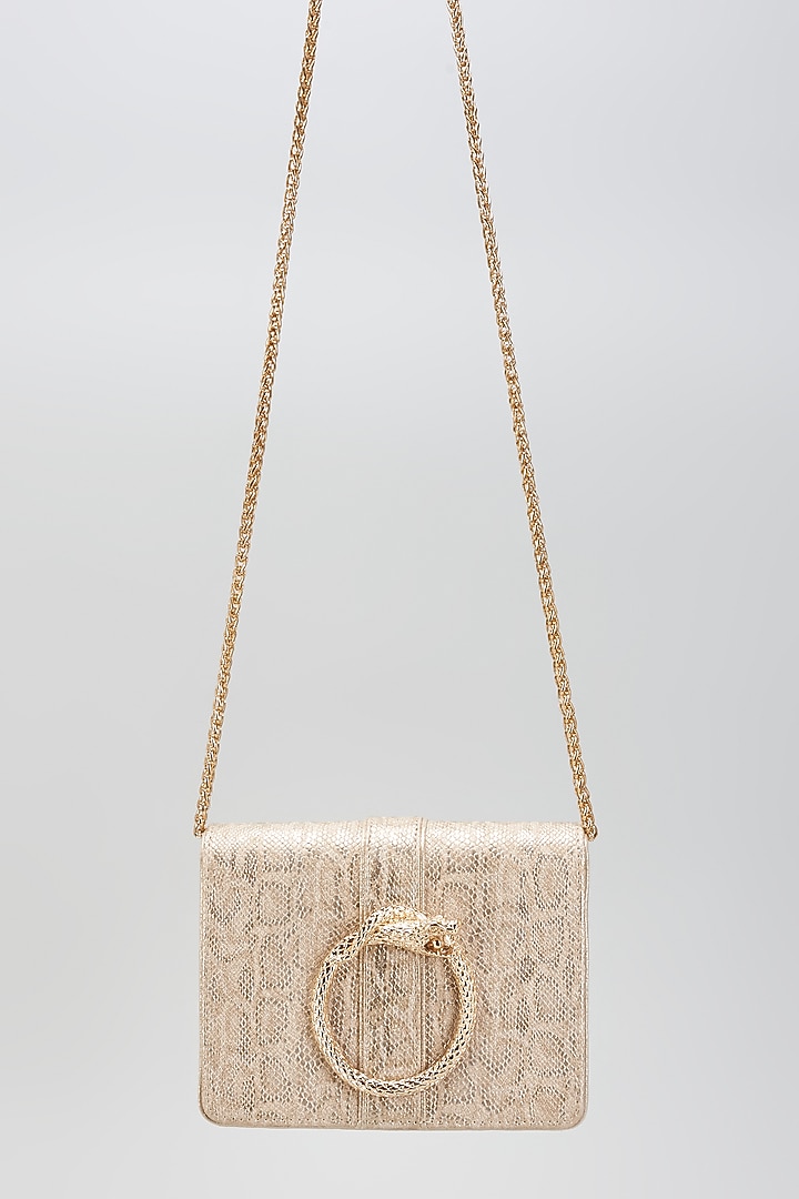 White & Gold Faux Leather Clutch by BEAU MONDE at Pernia's Pop Up Shop