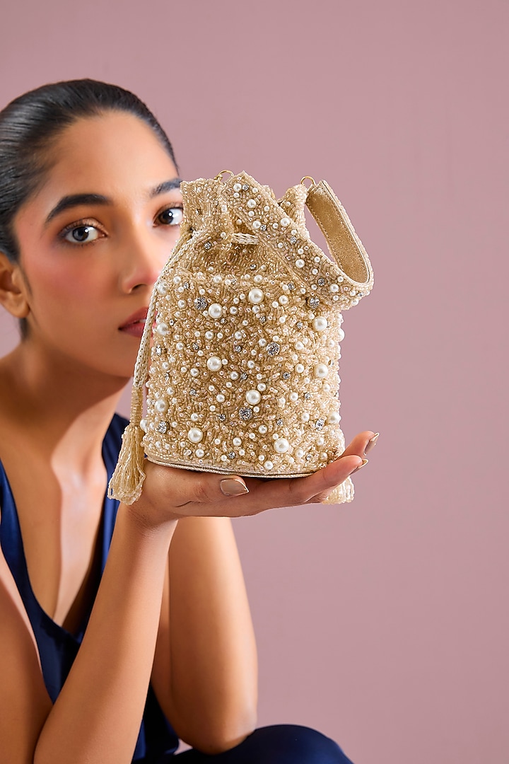 Pink & Gold Shimmer Faux Leather Potli by BEAU MONDE at Pernia's Pop Up Shop