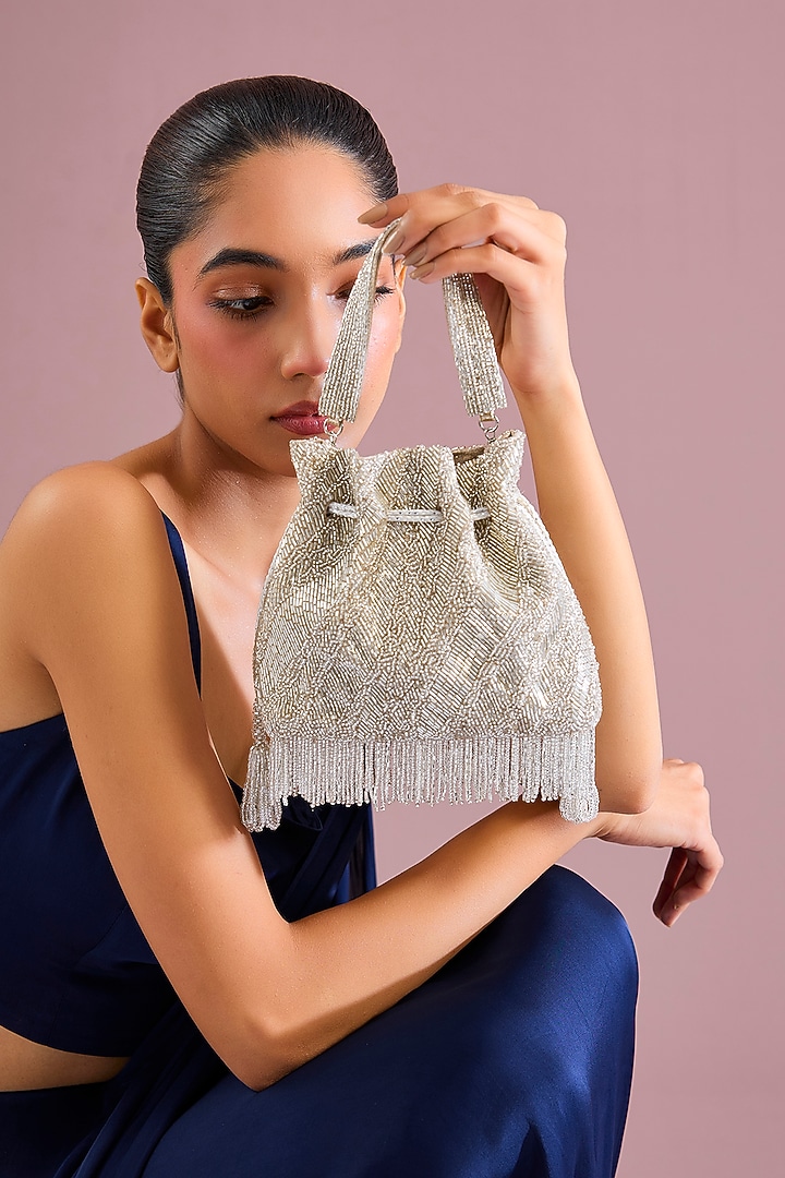 Silver Sunshine Faux Leather & Satin Potli by BEAU MONDE at Pernia's Pop Up Shop