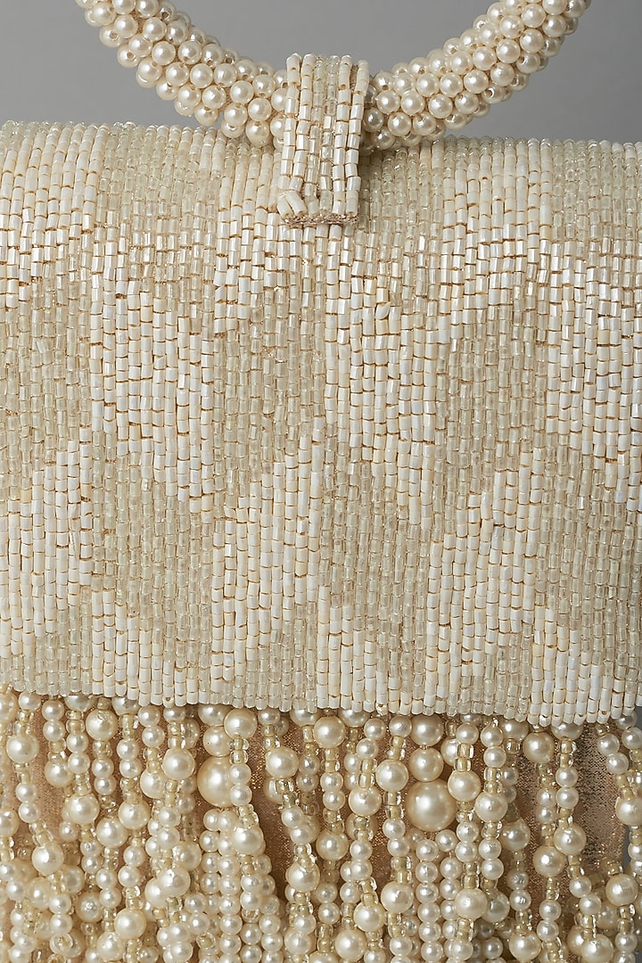 White Embroidered Clutch by BEAU MONDE at Pernia's Pop Up Shop