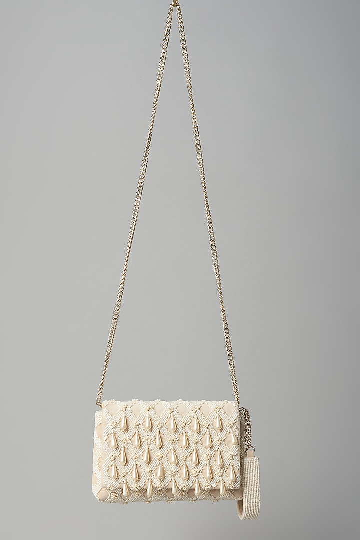 White Embroidered Clutch by BEAU MONDE at Pernia's Pop Up Shop