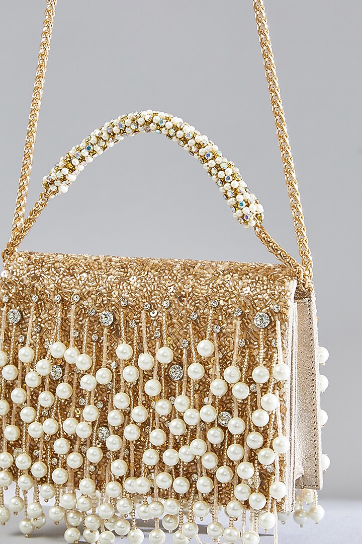 Rose Gold Sunshine Faux Leather Pearl Tassel Hand Embellished Clutch by BEAU MONDE at Pernia's Pop Up Shop