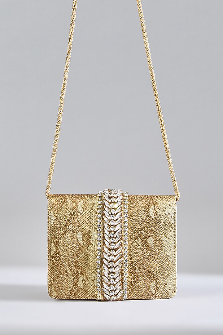 Gold Faux Leather Metal Stud Lace Clutch by BEAU MONDE at Pernia's Pop Up Shop
