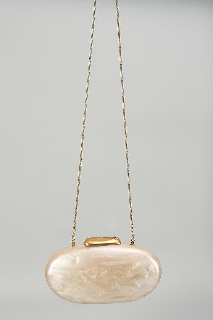 Gold Resin & Suede Oval Clutch by Be Chic at Pernia's Pop Up Shop