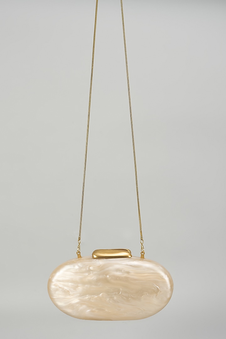 Gold Resin & Suede Oval Clutch by Be Chic at Pernia's Pop Up Shop