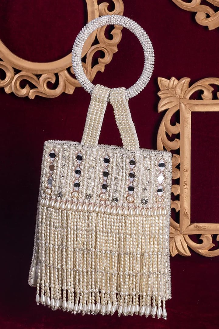 Ivory Silk Mirror Work Potli by Be Chic at Pernia's Pop Up Shop