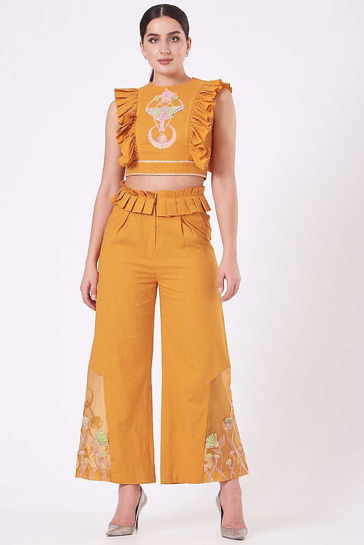 Yellow Embroidered Flared Pants by Beejoliyo at Pernia's Pop Up Shop