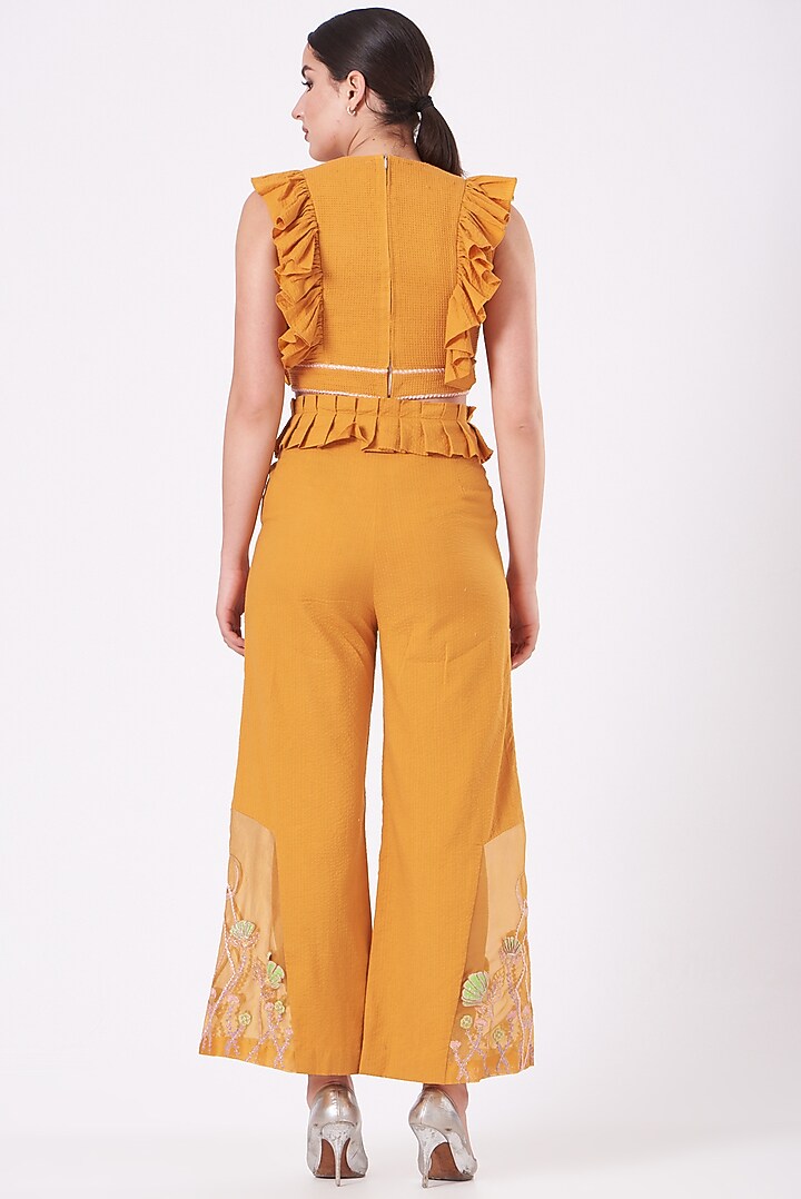 Yellow Embroidered Flared Pants by Beejoliyo at Pernia's Pop Up Shop