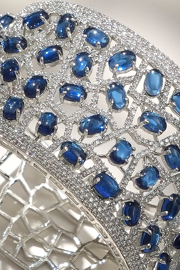 White Finish Diamond & Blue Stone Openable Bracelet by Beryachi at Pernia's Pop Up Shop