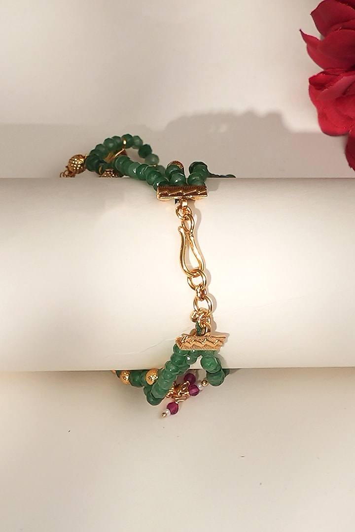 Gold Finish Kundan Polki & Green Beaded Adjustable Earchains by Beryachi at Pernia's Pop Up Shop