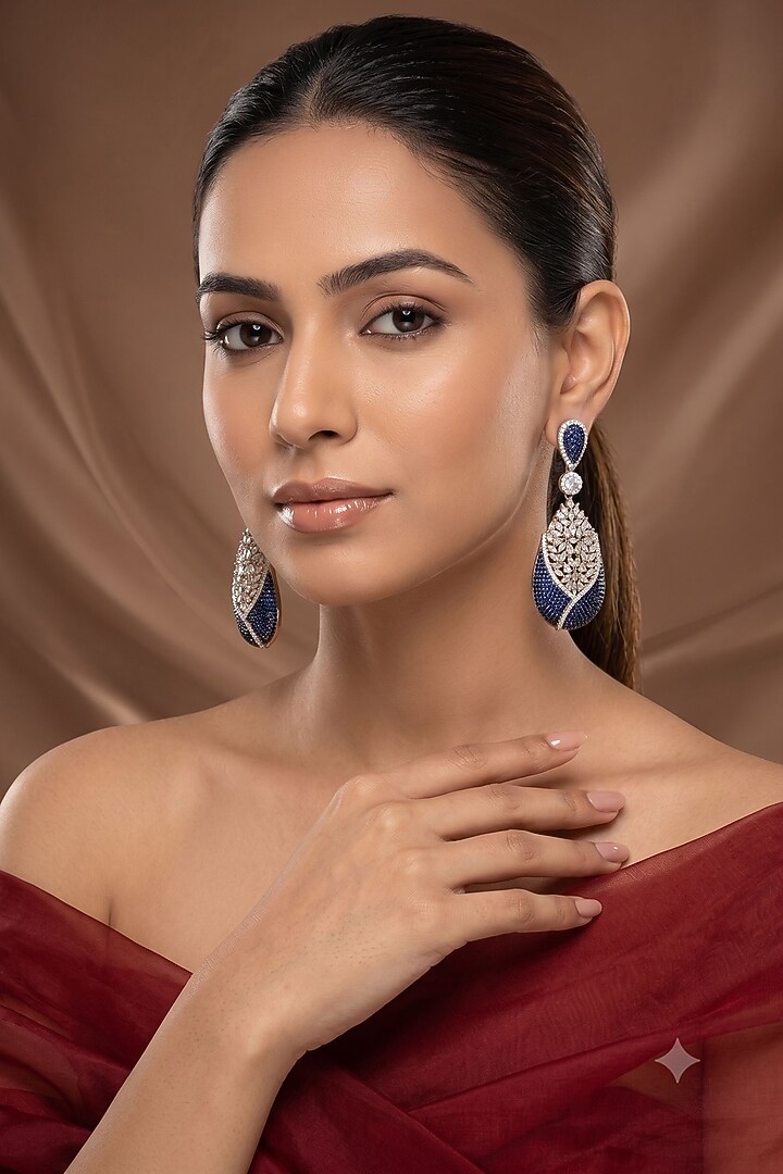 White Rhodium Finish American Diamond & Blue Stone Dangler Earrings by Beryachi at Pernia's Pop Up Shop