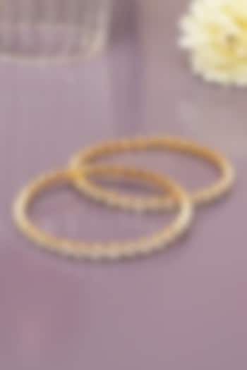 Gold Finish Diamond Bangles (Set of 2) by Beryachi at Pernia's Pop Up Shop
