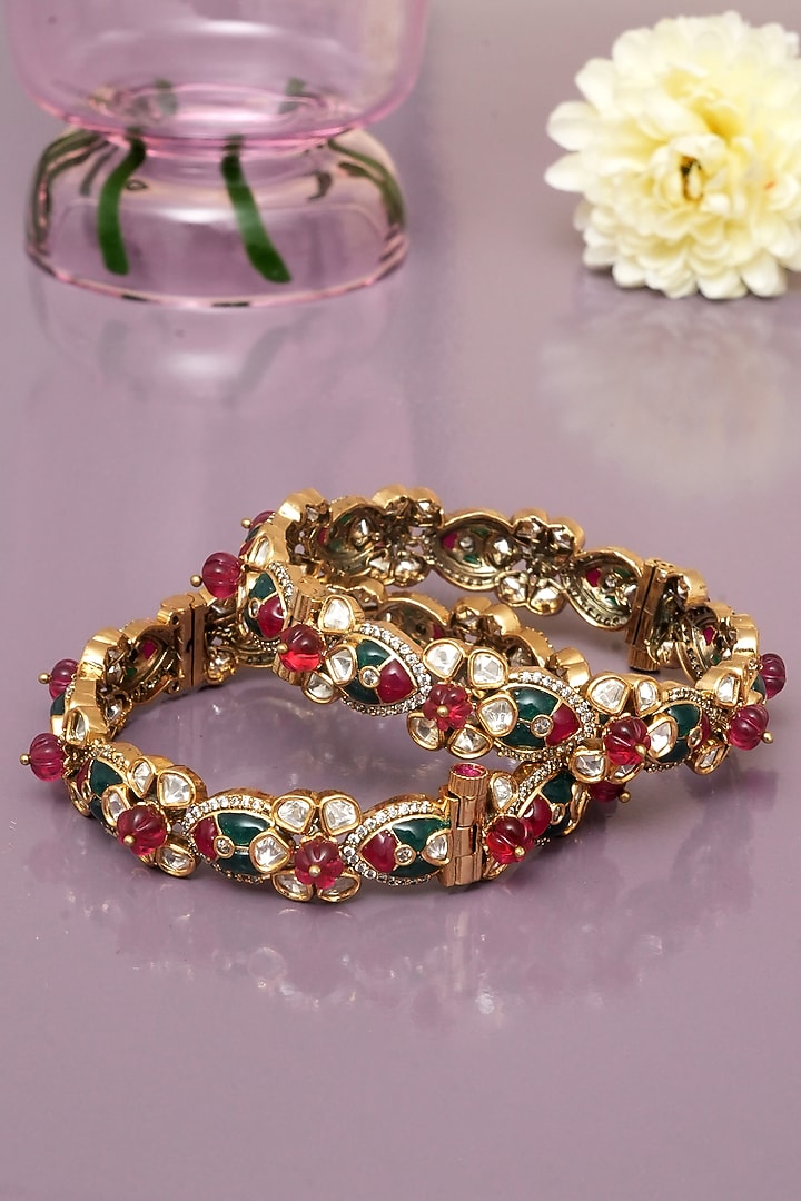 Gold Finish Ruby & Emerald Kundan Polki Bangles (Set of 2) by Beryachi at Pernia's Pop Up Shop