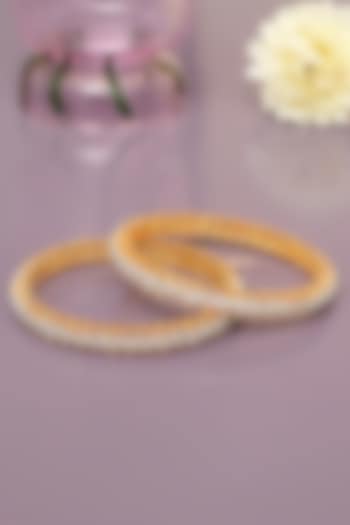 Gold Finish Diamond Bangles (Set of 2) by Beryachi at Pernia's Pop Up Shop