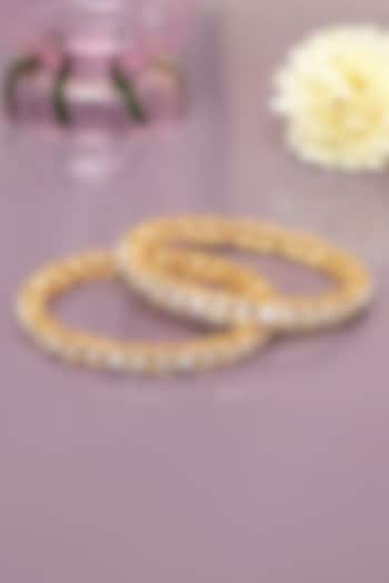 Gold Finish Diamond Bangles (Set of 2) by Beryachi at Pernia's Pop Up Shop