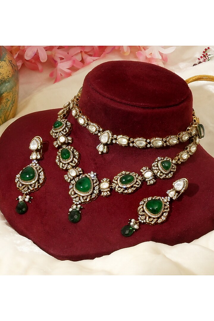 Gold Finish Moissanite Polki & Emerald Drop Layered Necklace Set by Beryachi at Pernia's Pop Up Shop