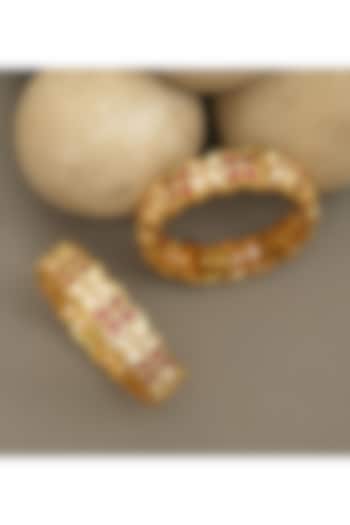 Gold Plated Moissanite Polki & Ruby Stone Bangles (Set Of 2) by Beryachi at Pernia's Pop Up Shop