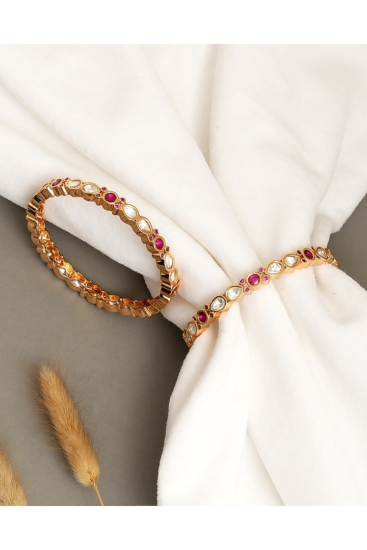 Gold Plated Moissanite Polki & Ruby Stone Bangles (Set Of 2) by Beryachi at Pernia's Pop Up Shop