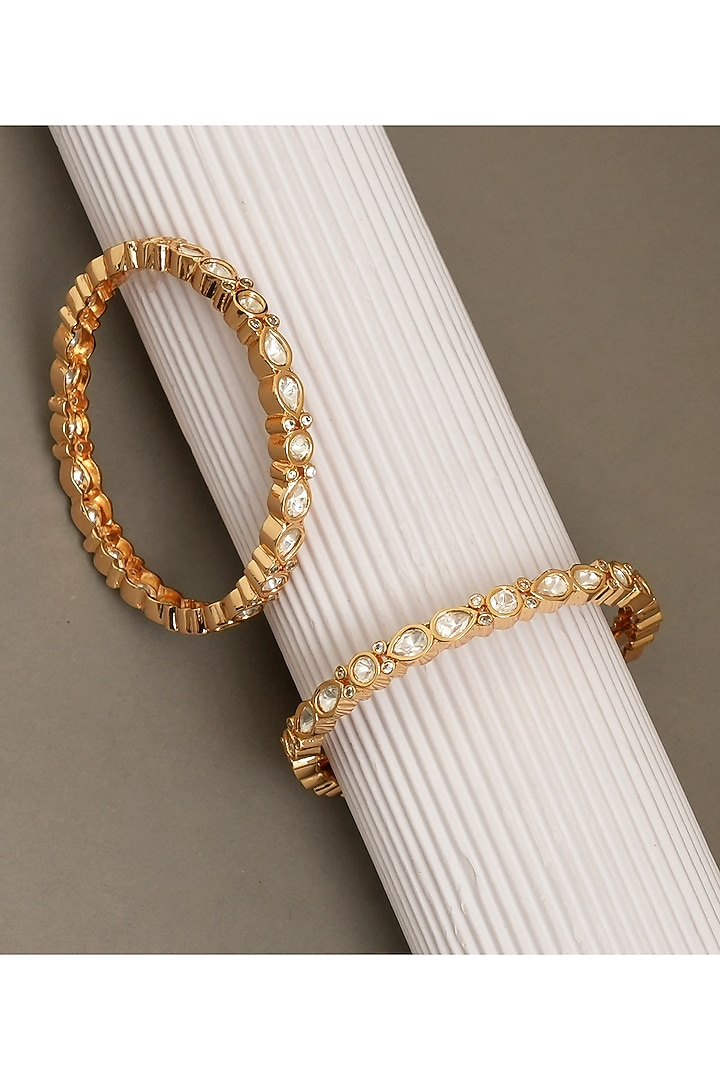 Gold Plated Moissanite Polki & Ruby Stone Bangles (Set Of 2) by Beryachi at Pernia's Pop Up Shop